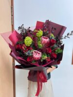 Protea and red roses - The Scarlet Empress