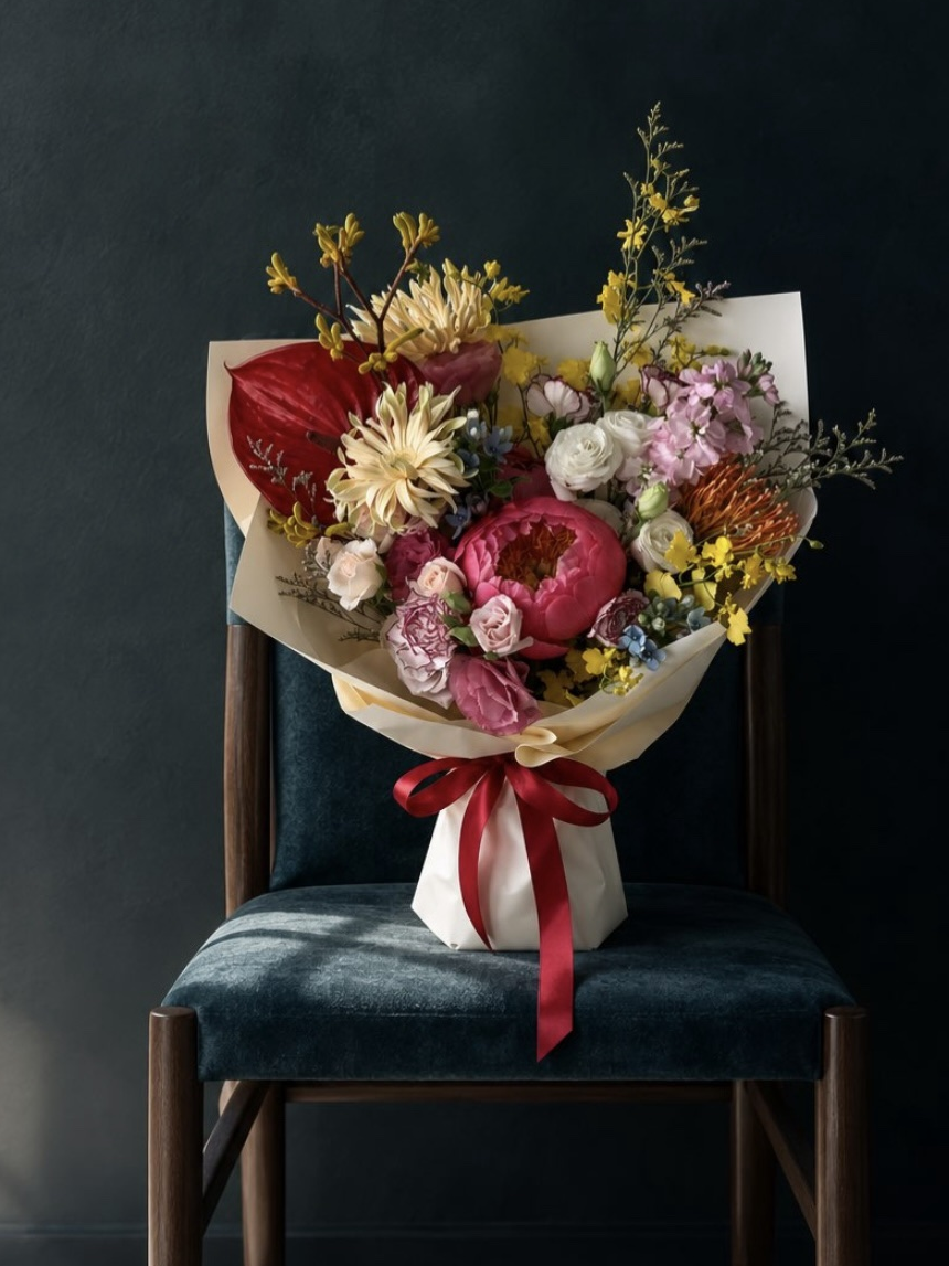 Spring Blooms — Bouquet on a teal chair, cropped Spring Blooms — Bouquet on a teal chair, cropped