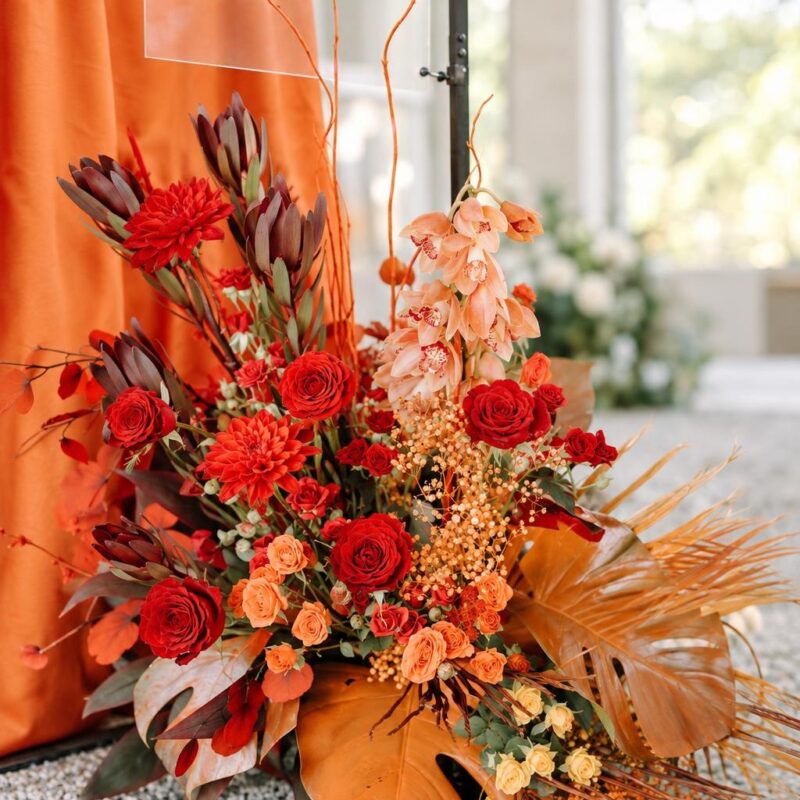 Red Rose & Peach Cymbidium Floor Arrangement