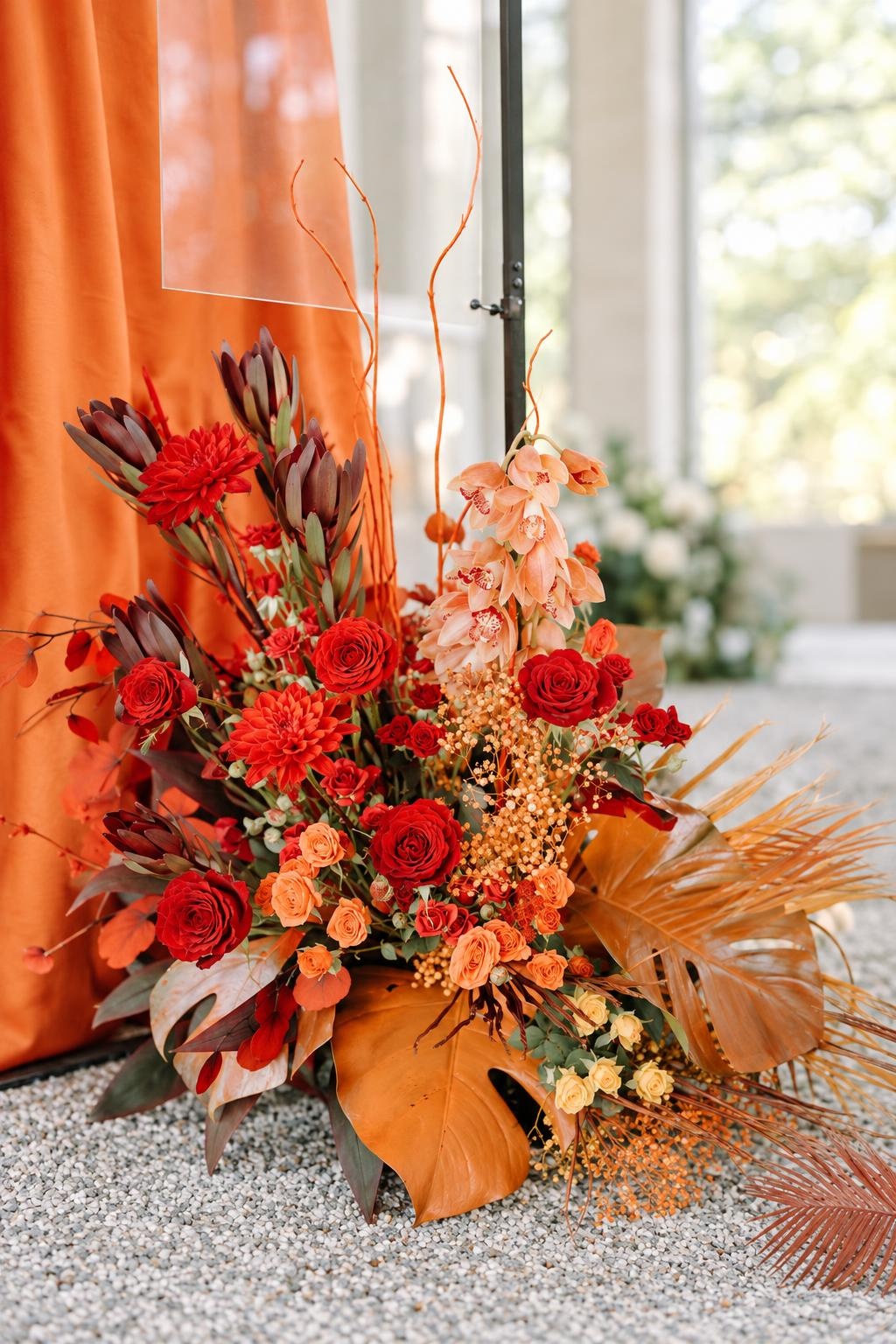Red Rose & Peach Cymbidium Floor Arrangement