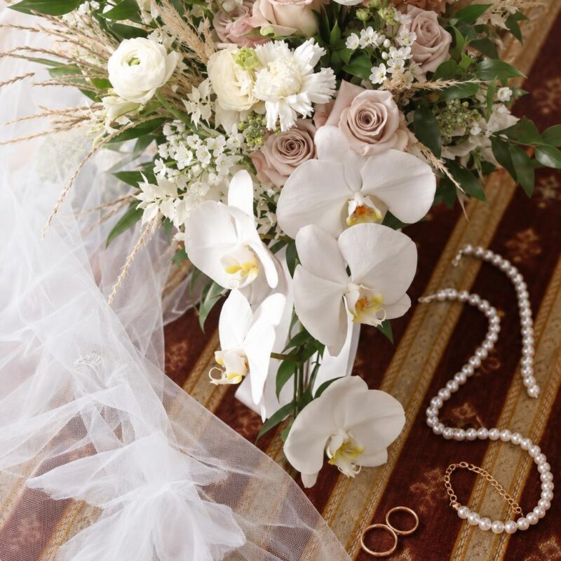 Cascading Ivory Orchid & Quicksand Rose Bridal Bouquet